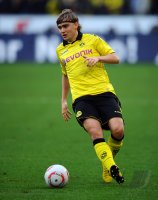 Fussball: 1. Bundesliga Saison 2010/2011, Dortmund: SCHMELZER am Ball