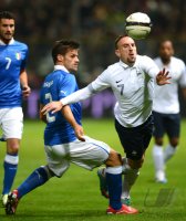 Fussball International:  Christian Maggio (li, Italien)  gegen Franck Ribery (Frankreich)