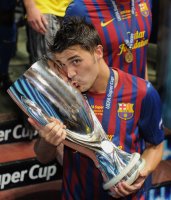 Fussball UEFA SUPER CUP 2011: JUBEL David Villa (Barca) mit Pokal