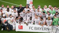 Fussball 1. Bundesliga 24/25: FC Bayern Muenchen feiert die 34. Deutschen Meisterschaft
