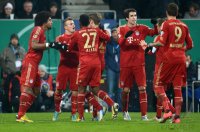 FUSSBALL DFB POKAL  Saison 2012/2013:  Dante , Xherdan Shaqiri , David Alaba , Javi , Javier Martinez (v.li., FC Bayern Muenchen)