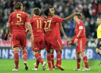 Fussball 1. Bundesliga, Saison 2011/2012:  Daniel van Buyten, Ivica Olic, David Alaba , Philipp Lahm (v. li., FC Bayern Muenchen)