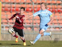 Fussball Regionalliga Sued 2011/2012:  Sinan Tekerci  (li. 1. FC Nuernberg) gegen Christoph Rech (re, TSV 1860 Muenchen)