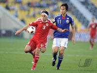 Fussball AFC Asian Cup 2011:  Suleiman Salman (li, Jordanien) gegen Ryoichi Maeda (re, Japan)