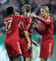 Fussball DFB Pokal 11/12 :  David Alaba, Thomas Mueller , Anatoliy Tymoshchuk , Anatoli Timoschtschuk (v. li., FC Bayern Muenchen)