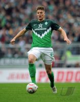 Fussball: 1. Bundesliga Saison 2010/2011: Werder Bremen, PROEDL am Ball