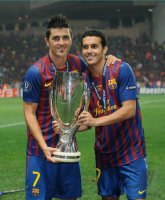 Fussball UEFA SUPER CUP 2011: JUBEL Pedro Rodriguez  (Barca) und David Villa (Barca) mit Pokal