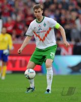 Fussball 1. Bundesliga, Saison 2011/2012: Werder Bremen, MERTESACKER am Ball