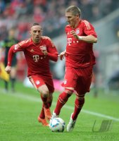 Fussball 1. Bundesliga, Saison 2011/2012:  Franck Ribery (li,) mit Bastian Schweinsteiger (FC Bayern Muenchen)
