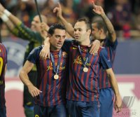 Fussball UEFA SUPER CUP 2011: Xavi Hernandez (Barca)  und Andres Iniesta (Barca)