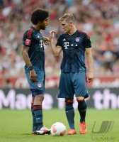 Fussball International Audi Cup 2013: Bastian Schweinsteiger (FC Bayern Muenchen) und Dante (FC Bayern Muenchen)