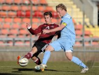 Fussball Regionalliga Sued 2011/2012:  Sinan Tekerci  (li. 1. FC Nuernberg) gegen Christoph Rech (re, TSV 1860 Muenchen)