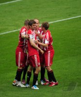 Fussball 1. Bundesliga :  JUBEL Thomas Mueller,  Arjen Robben, Philipp Lahm (v. li., FC Bayern Muenchen)