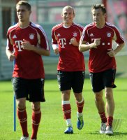 Fussball 1. Bundesliga: Arjen Robben , Ivica Olic (v.li., FC Bayern Muenchen)