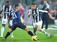 FUSSBALL SERIE A: Gargano (li, Inter Mailand) gegen Claudio Marchisio (Juventus Turin)