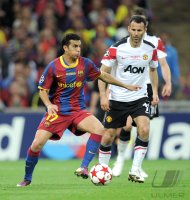 Fussball Champions League Finale 2011:  Pedro Rodriguez  (li, Barca) gegen Ryan Giggs (re, Manchester United FC)