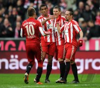 Fussball 1. Bundesliga : (v. li.) Bayern Jubel Arjen Robben, Luiz Gustavo, Bastian Schweinsteiger, Franck Ribery