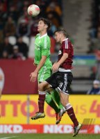 Fussball 1. Bundesliga, Saison 2012/2013: Srjdan Lakic (li VfL Wolfsburg) gegen Per Nilsson (1 FC Nuernberg)