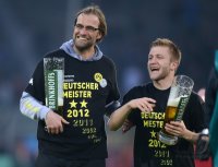 Fussball 1. Bundesliga :  Trainer Juergen Klopp (li.) mit Jakub  KUBA Blaszczykowski (Borussia Dortmund)