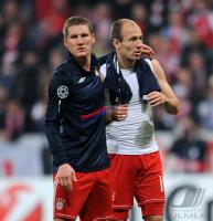 FUSSBALL  International CHL 09/10: Bastian Schweinsteiger, Arjen Robben (v. li., FCB)