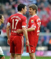 Fussball 1. Bundesliga : Mark van Bommel, Thomas Mueller (v. li., FCB)