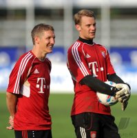 Fussball 1. Bundesliga Saison   2011/2012 :  Bastian Schweinsteiger, Torwart Manuel Neuer (v. li., FC Bayern Muenchen)