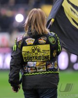Fussball 1. Bundesliga, Saison 2011/2012: Borussia Dortmund Fahnentraeger Fan mit Kutte