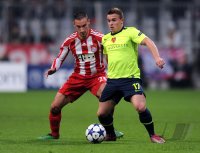 Fussball Champions League: Diego Contento (li, FC Bayern Muenchen) gegen Xherdan Shaqiri  (re, FC Basel)