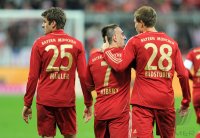 Fussball 1. Bundesliga, Saison 2011/2012:  Thomas Mueller, Franck Ribery, Holger Badstuber (v. li., FC Bayern Muenchen)
