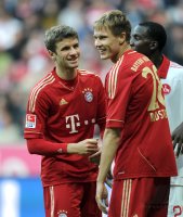 Fussball 1. Bundesliga, Saison 2011/2012:  Thomas Mueller , Holger Badstuber (v. li., FC Bayern Muenchen)