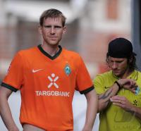 Fussball 1. Bundesliga  Saison 2010/2011:  Torsten Frings  und Per Mertesacker (SV Werder Bremen)