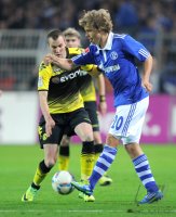 Fussball 1. Bundesliga, Saison 2011/2012: JUBEL nach dem Sieg Kevin Grosskreutz, Torwart Roman Weidenfeller, Sebastian Kehl (v. li., Borussia Dortmund)