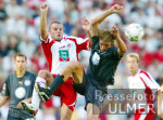 Fussball 1. Bundesliga: Koeln - Wolfsburg, Zweikampf
