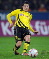 Fussball: 1. Bundesliga Saison 2010/2011: Dortmund SAHIN am Ball