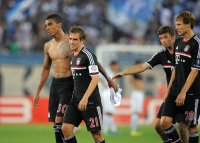 Fussball CHL  Saison 2011/2012: Luiz Gustavo, Philipp Lahm , Thomas Mueller , Holger Badstuber (v. li., FC Bayern Muenchen)