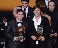 Fussball International  FIFA Ballon d Or 2012: Sieger Lionel Messi (Argentinien) und Siegerin Abby Wambach (USA)