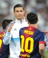 FUSSBALL Primera Division/Super Cup 2012: Lionel Messi (Barca) und Cristiano Ronaldo (Real Madrid)