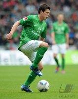 Fussball 1. Bundesliga, Saison 2011/2012: Zlatko Junuzovic (SV Werder Bremen)  Einzelaktion am Ball