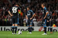 Fussball CHL  Saison 2010/2011:  Enttaeuschung Klaas Jan Huntelaar, Raul, Edu (v. li., FC Schalke 04)