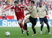 Fussball 1. Bundesliga: FSV Mainz 05 - Bayern Muenchen, Zweikampf