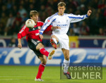 Fussball 1. Bundesliga: Leverkusen - Schalke, Zweikampf