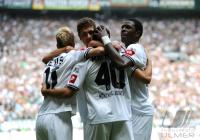1. FUSSBALL BUNDESLIGA: Marco Reus, Karim Matmour, Mohamadou Mo Idrissou (v. li., Gladbach)