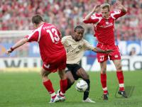 Fussball 1. Bundesliga: FSV Mainz 05 - Bayern Muenchen, Zweikampf