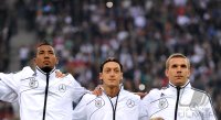 FUSSBALL INTERNATIONAL: Jerome BOATENG, Mesut Oezil, Lukas PODOLSKI  (v. li., Deutschland)