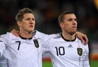 Fussball Deutsche Nationalmannschaft : (v. li.) Bastian SCHWEINSTEIGER, Lukas PODOLSKI (Deutschland)