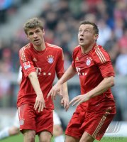 Fussball 1. Bundesliga, Saison 2011/2012: Thomas Mueller (li,)  mit Ivica Olic (FC Bayern Muenchen)