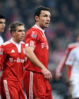 Fussball 1. Bundesliga : Enttaeuschung Mark van Bommel mit Philipp Lahm  (FCB)