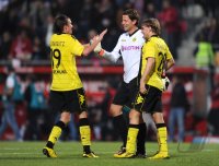 1. Fussball Bundesliga: (v. li.) BVB JUBEL nach dem Sieg, Kevin Grosskreutz, Torwart Roman Weidenfeller, Marcel Schmelzer