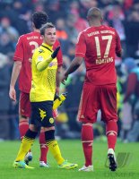 Fussball 1. Bundesliga, Saison 2011/2012: Mario Goetze (li, Borussia Dortmund) mit Jerome Boateng (FC Bayern Muenchen)