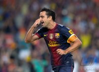 FUSSBALL Primera Division/Super Cup 2012: JUBEL Xavi Hernandez (Barca)